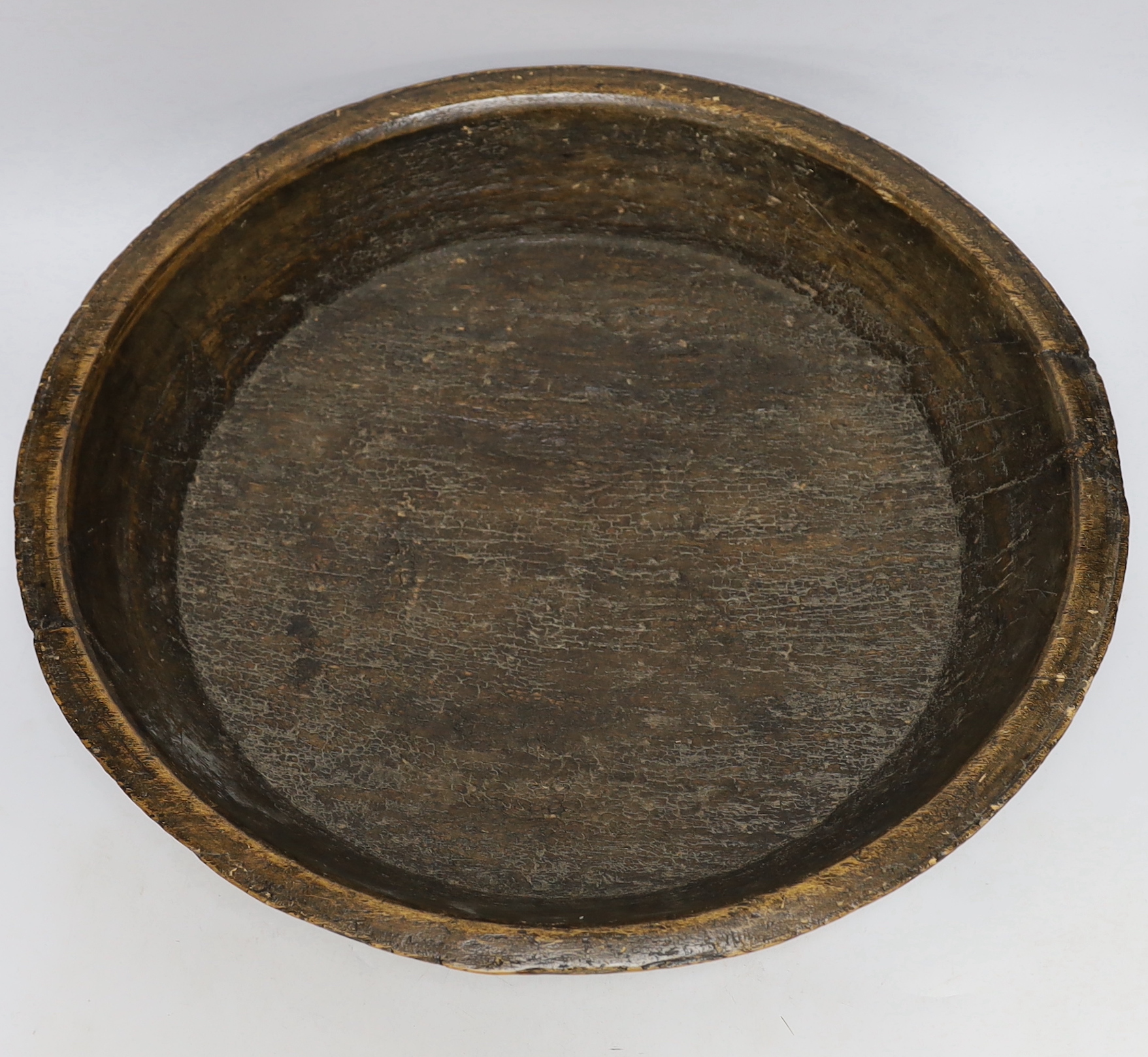 A Provincial turned alder bowl, 51cm diameter